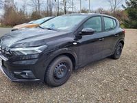 Gebraucht Dacia Sandero Expression 91 PS (66 kW) 2024 Perlmuttschwarz Kleinwagen