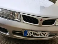Gebraucht Mitsubishi Carisma 90 PS (66 kW) 1998 Silber Limousine
