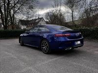 Second-hand Mercedes E220 AMG line 194 CP (142 kW) 2020 Albastru Coupe