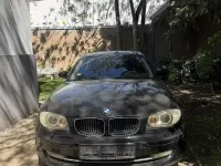 Second-hand BMW 116 122 CP (89 kW) 2007 Negru Hatchback