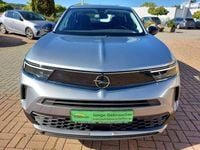 Gebraucht Opel Mokka-e Edition 100 kW (136 PS) 2021 Kontrast grau/quarz silber SUV