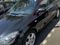 Gebraucht Kia Ceed Sportswagon Edition 7 125 PS (91 kW) 2011 Schwarz Kombi