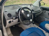 Gebraucht VW New Beetle 107 PS (78 kW) 2002 Schwarz Kleinwagen
