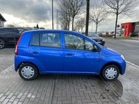 gebraucht Daihatsu Cuore Top Edition 25 1,0 Automatik 2.Hand S-Heft