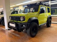 Gebraucht Suzuki Jimny Comfort+ 102 PS (75 kW) 2020 Kinetic yellow/bluish black SUV