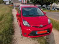 Gebraucht Toyota Aygo 68 PS (50 kW) 2012 Rot Kleinwagen