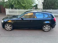 Gebraucht BMW 116 122 PS (89 kW) 2009 Schwarz Kleinwagen