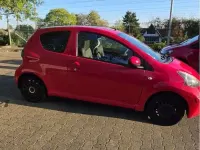 Gebraucht Toyota Aygo 68 PS (50 kW) 2010 Rot Kleinwagen