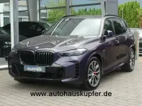 Gebraucht BMW X5 Performance 489 PS (359 kW) 2024 Sonderlack techno violett SUV