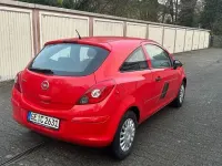 Gebraucht Opel Corsa Edition 69 PS (50 kW) 2014 Rot Kleinwagen
