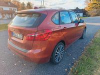 Gebraucht BMW 225 Sport Line 136 PS (100 kW) 2018 Sunset orange metallic Van / Kleinbus