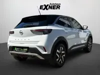 Gebraucht Opel Mokka Elegance 101 PS (74 kW) 2023 Jade weiß/dach und spiegel schwarz SUV
