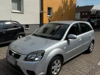 Gebraucht Kia Rio 71 PS (52 kW) 2010 Silber Kleinwagen