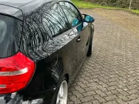 Gebraucht BMW 116 122 PS (89 kW) 2007 Schwarz Kleinwagen