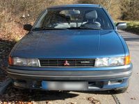 Second-hand Mitsubishi Lancer 97 CP (71 kW) 1990 Albastru Berlinǎ