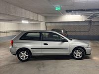 Gebraucht Mazda 323 Luxury 88 PS (64 kW) 1999 Silber Kleinwagen