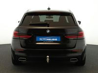 Gebraucht BMW 520 190 PS (139 kW) 2023 Saphirschwarz metallic Kombi