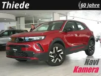 Gebraucht Opel Mokka Elegance 131 PS (96 kW) 2024 Power rot metallic SUV