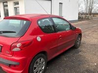 Gebraucht Peugeot 206+ 75 PS (55 kW) 2011 Rot Kleinwagen
