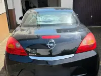 Używany Opel Tigra 90 KM (66 kW) 2006 Czarny Kabriolet