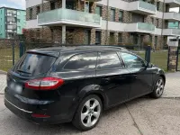 Używany Ford Mondeo 115 KM (84 kW) 2011 Czarny Kombi