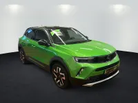 Gebraucht Opel Mokka Elegance 101 PS (74 kW) 2022 Matcha green/ikone gruen (metallic) SUV
