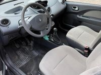 Second-hand Renault Twingo 58 CP (42 kW) 2010 Negru Hatchback