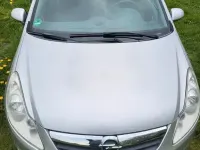 Używany Opel Corsa Eco 86 KM (63 kW) 2010 Srebrny Hatchback