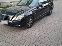 Używany Mercedes E200 184 KM (135 kW) 2009 Czarny Sedan/Limuzyna