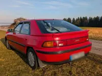 Gebraucht Mazda 323F 88 PS (64 kW) 1990 Rot Kleinwagen