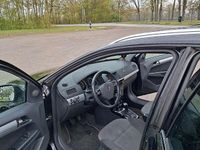 Second-hand Opel Astra 110 CP (80 kW) 2010 Negru Break