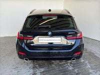 Gebraucht BMW 320e 163 PS (119 kW) 2022 Schwarz Kombi