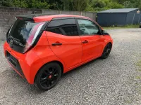 Gebraucht Toyota Aygo 70 PS (51 kW) 2014 Orange Kleinwagen