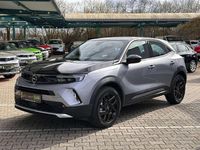 Gebraucht Opel Mokka-e Elegance 100 kW (136 PS) 2022 Kontrast grau SUV