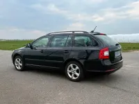 Usata Skoda Octavia 110 CV (80 kW) 2012 Nero Station wagon