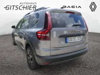 Gebraucht Dacia Jogger Extreme 101 PS (74 kW) 2024 Dolomitgrau (grau) Van / Kleinbus