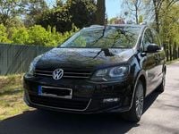 Second-hand VW Sharan 170 CP (125 kW) 2012 Negru Monovolum