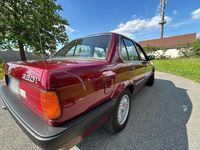 Używany BMW 320 129 KM (94 kW) 1990 Czerwony Sedan/Limuzyna