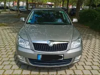 Używany Skoda Octavia Ambiente 105 KM (77 kW) 2011 Beżowy Sedan/Limuzyna