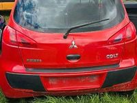 Second-hand Mitsubishi Colt 75 CP (55 kW) 2007 Roșu Hatchback