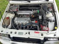 Gebraucht Ford Escort Cabriolet 105 PS (77 kW) 1989 Weiß Cabrio