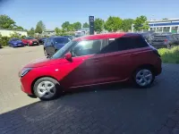 Gebraucht Suzuki Swift Comfort 83 PS (61 kW) 2025 Burning red pearl met. super p Kleinwagen
