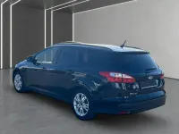 Gebraucht Ford Focus Trend 105 PS (77 kW) 2011 Pantherschwarz metallic Kombi