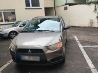 Gebraucht Mitsubishi Colt 95 PS (69 kW) 2009 Braun Kleinwagen
