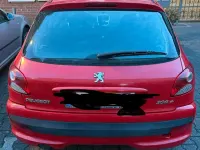 Gebraucht Peugeot 206+ 75 PS (55 kW) 2009 Rot Kleinwagen