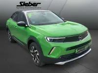 Gebraucht Opel Mokka Elegance 131 PS (96 kW) 2023 Ikone grün SUV