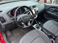 Gebraucht Kia Rio 90 PS (66 kW) 2015 Rot Kleinwagen
