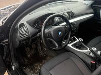 Gebraucht BMW 116 122 PS (89 kW) 2006 Schwarz Kleinwagen