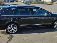 Używany Skoda Superb 170 KM (125 kW) 2012 Czarny Kombi