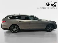 Gebraucht BMW 530e 299 PS (219 kW) 2024 Oxidgrau metallic Kombi